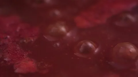 Tomato sauce boiling slow motion Stock Footage 131858722