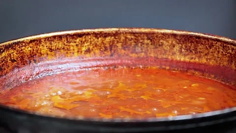 Tomato sauce cooking in a pan Stock Footage 153227899