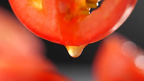 Tomato sauce dropping from a Tomato slice in slow motion Stock-Footage 127801588