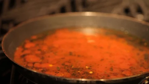 Tomato sauce simmering Stock Footage 117541472