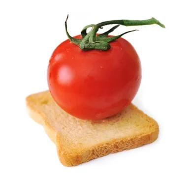 Tomato on slice of bread isolated, toast, vegetarian, vegetable, cereal Foto stock
