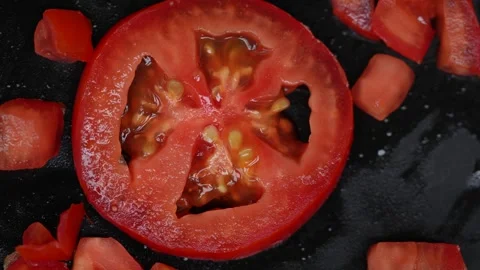 Tomato slice on fry pan Stock Footage 257180846