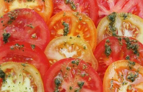 Tomato slices background Stock Photos