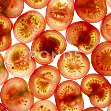 Tomato slices Stock Photos