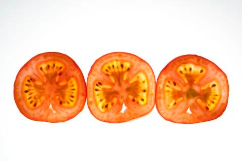 Tomato slices Stock Photos