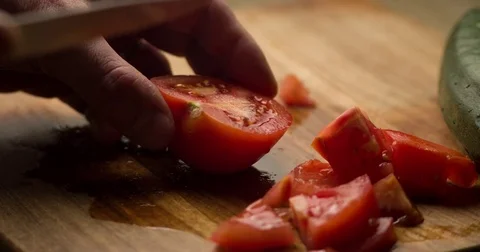 Tomato slicing slowmotion close up Stock Footage 72565745