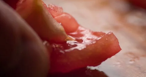 Tomato slicing slowmotion close up Stock Footage 72584736