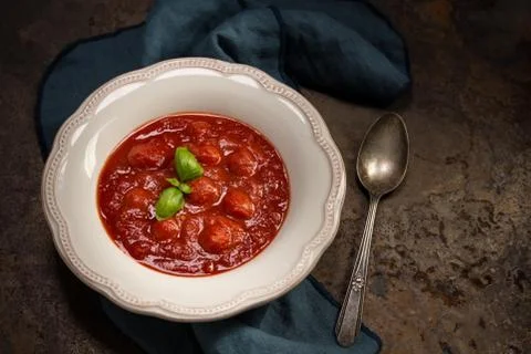 Tomato soup with basil Stock Photos