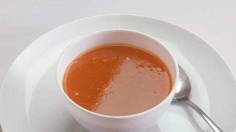 Tomato soup garnish Stock Footage 107360390