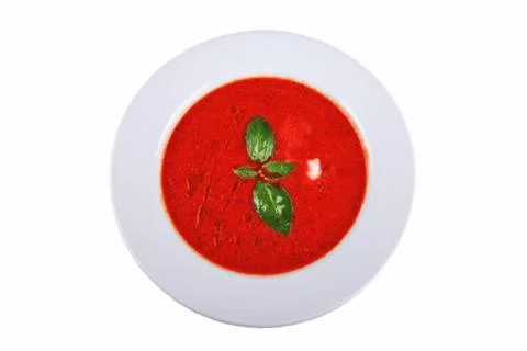 Tomato soup on kitchen table. top shot Stock Photos