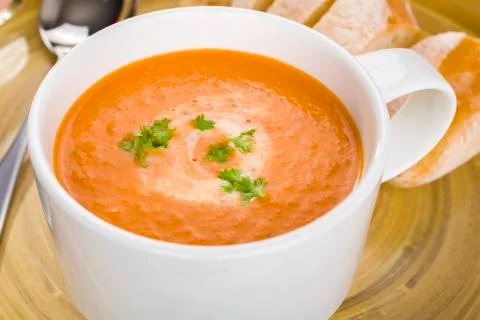 Tomato soup in a mug Stock Photos