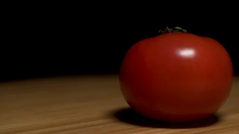 Tomato on a spinning board. Stock Footage 104657560