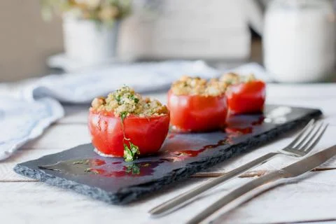 Tomato stuffed with couscous Stock Photos