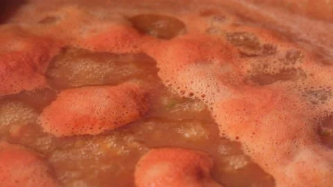 Tomato vegetable sauce close-up boiling in saucepan in the process of cooking Stock Footage 201618641