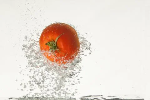 Tomato In The Water Stock Photos