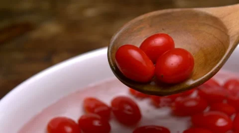 Tomato in water, Slow Motion Stock Footage 9292366