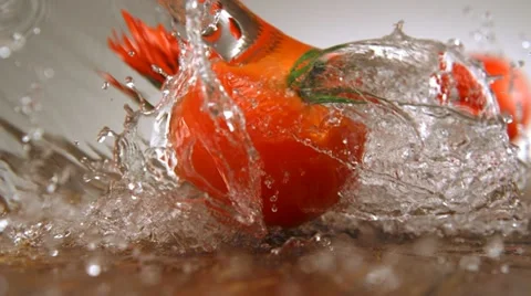 Tomato with water splash, Slow Motion Stock Footage 10864152