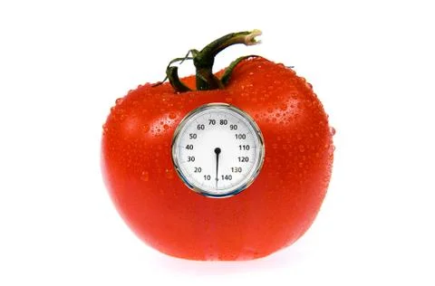 Tomato with weight scale Stock Photos