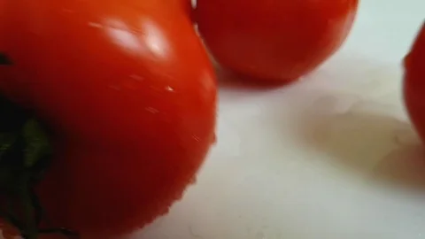 Tomato wet on white background drops Stock Footage 87992973