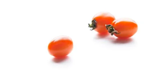 Tomato on a white background. Stock Photos