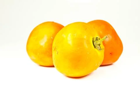 Tomato on a white background. Stock Photos