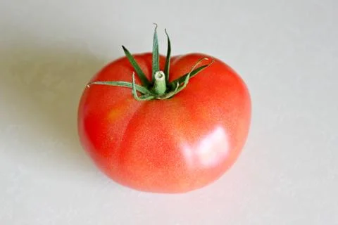 Tomato on a white background Stock Photos