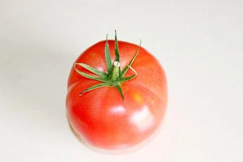 Tomato on a white background Stock Photos