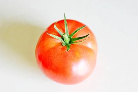 Tomato on a white background Stock Photos