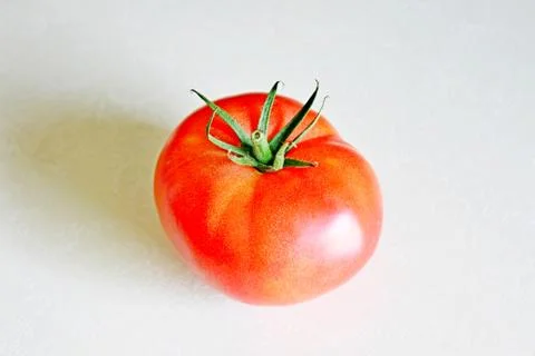 Tomato on a white background Stock Photos