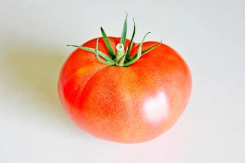 Tomato on a white background Stock Photos