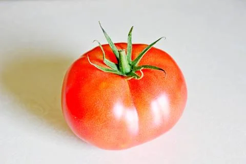 Tomato on a white background Stock Photos