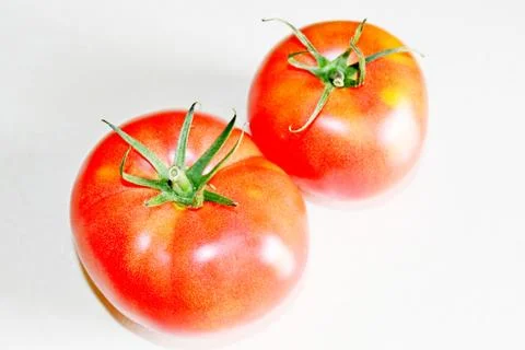 Tomato on a white background Stock Photos