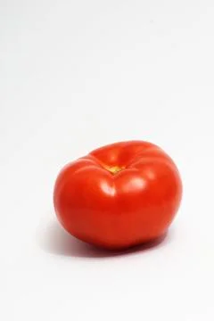 A Tomato on white ground Stock Photos