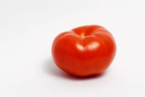 A Tomato on white ground Stock Photos
