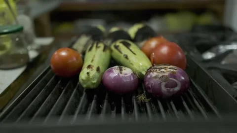 Tomato, zucchini, eggplant, onions and other vegetables are grilled Stock Footage 245872653