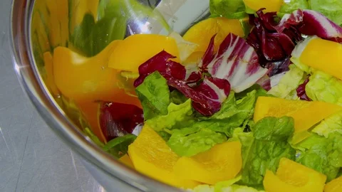Tomatoes added to the salad Video stock 70986364