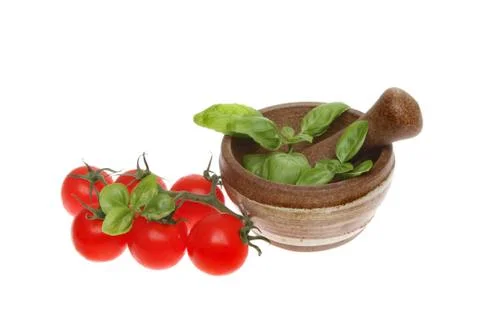 Tomatoes and basil Stock Photos