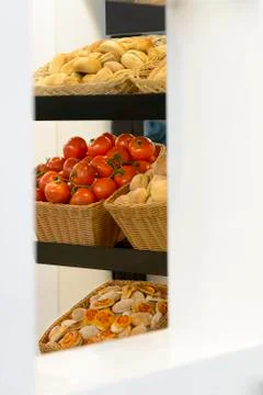 Tomatoes and bread buns Photos
