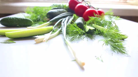 Tomatoes and cucumbers on the table in kitchen Stockbeeldmateriaal 39795650