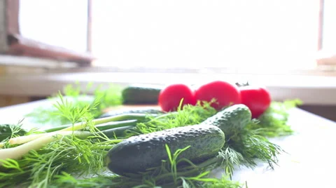 Tomatoes and cucumbers on the table in kitchen Stockbeeldmateriaal 39968160