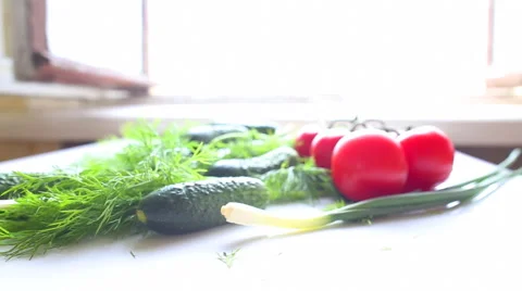 Tomatoes and cucumbers on the table in kitchen 動画素材 42545837