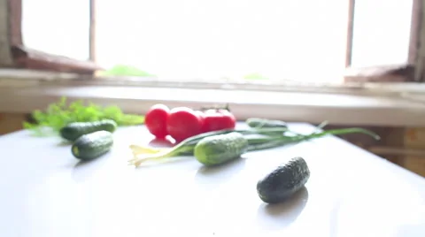 Tomatoes and cucumbers on the table in kitchen Stock-Footage 42888018