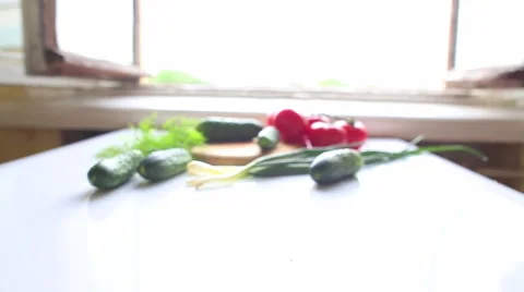 Tomatoes and cucumbers on the table in kitchen 库存影片 48992555