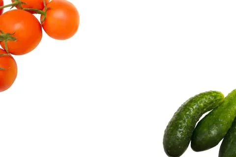 Tomatoes and cucumbers on a white background Stock Photos