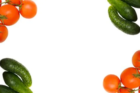 Tomatoes and cucumbers on a white background Stock Photos