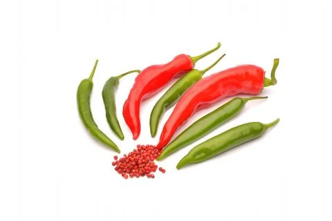 Tomatoes and hot chilli on background Stock Photos