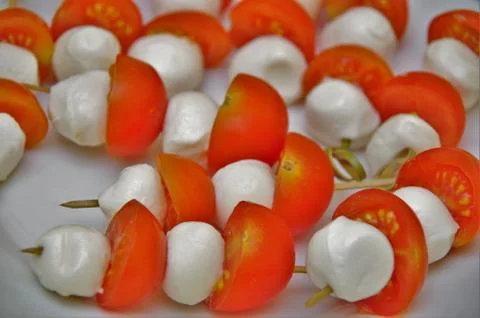 Tomatoes and mozzarella Stock Photos
