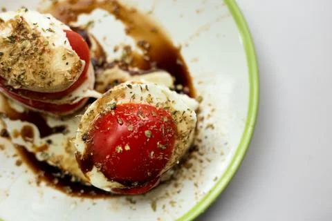 Tomatoes and Mozzarella Stock Photos