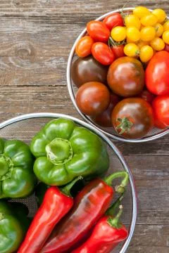 Tomatoes and pepper Stock Photos