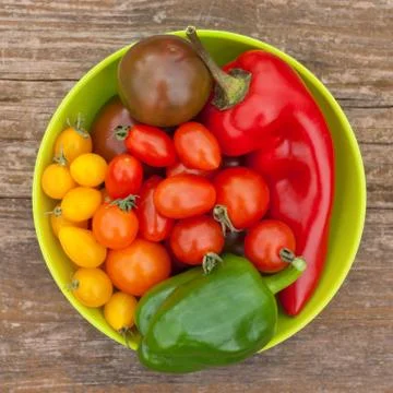 Tomatoes and pepper Stock Photos